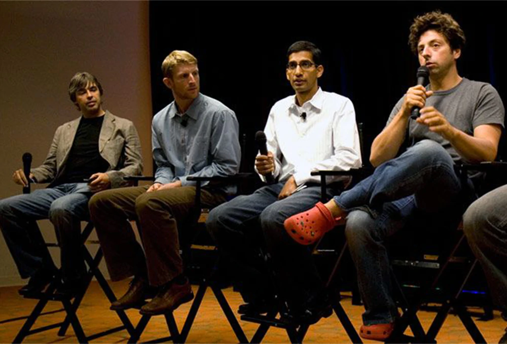 Google's co-founders Larry Page (<em>left</em>) and Sergey Brin (<em>right</em>), Brian Rakowski (<em>second from left</em>), and Sundar Pichai (<em>second from right</em>), when he was vice president of product management at Google