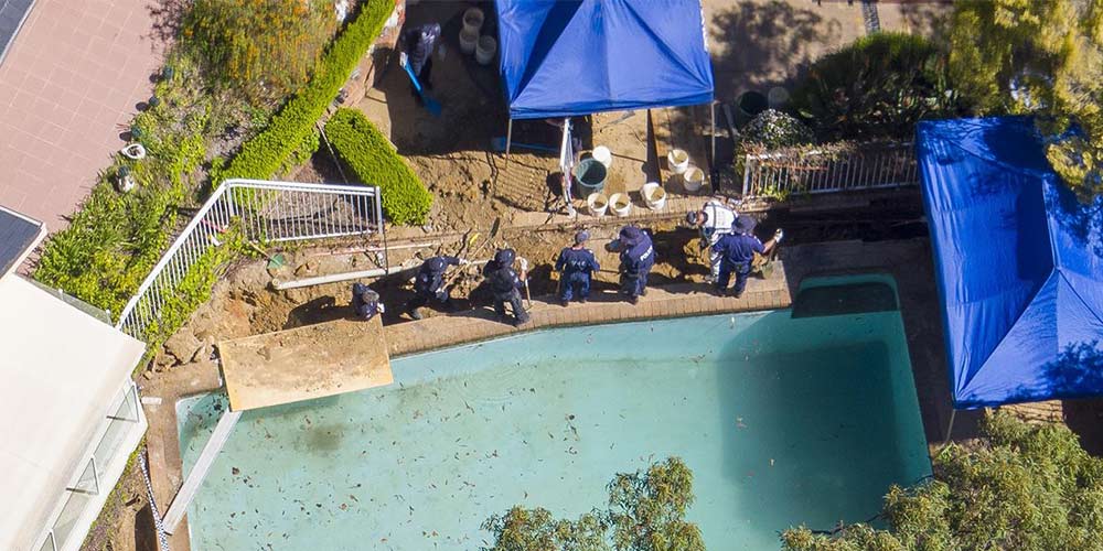 The police photographed digging into the foundations of the area at Chris' Bayview property, in their search for evidence to explain her sudden disappearance.