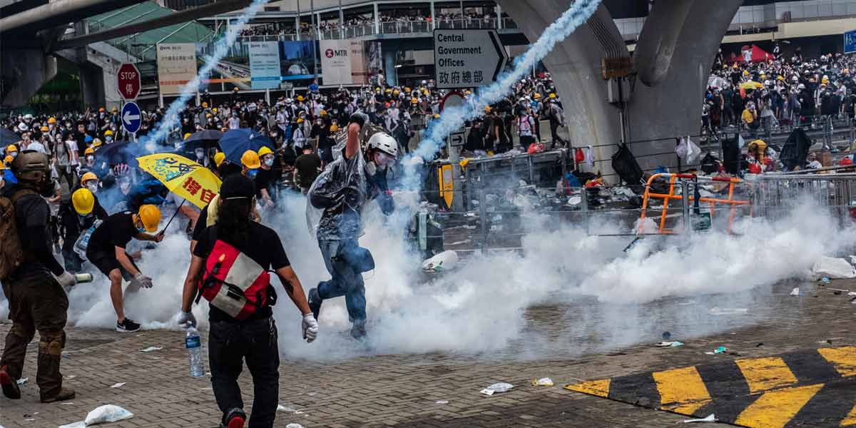 The police fought the protesters with tear gas, pepper spray and batons, near Hong Kong's Legislative Council