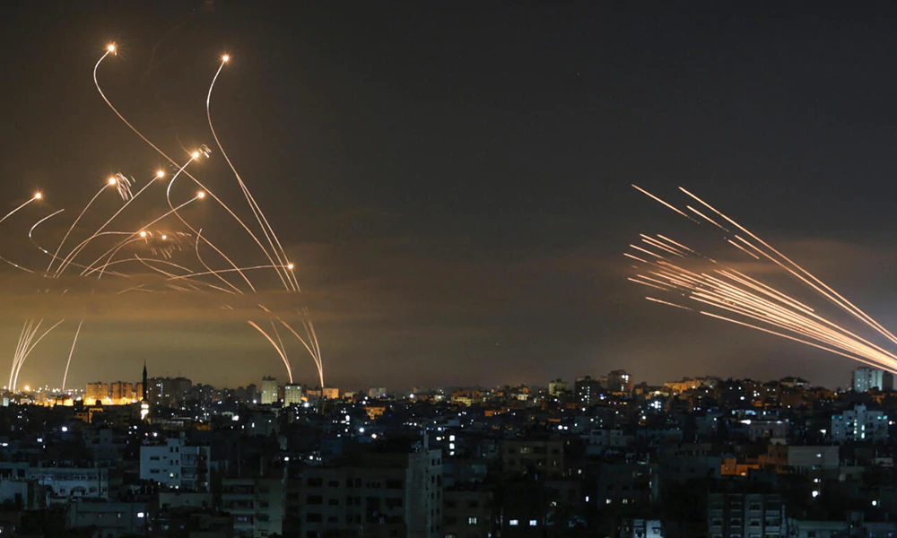 The Israeli Iron Dome missile defense system intercepts rockets fired by the Hamas