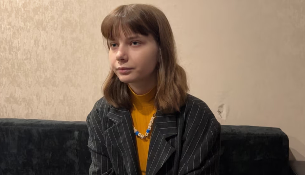 Olesya Krivtsova under house arrest at her mother's apartment, identifies herself as a pacifist