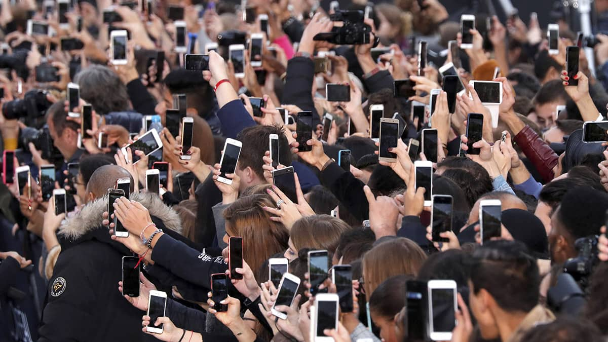 People using smartphones.