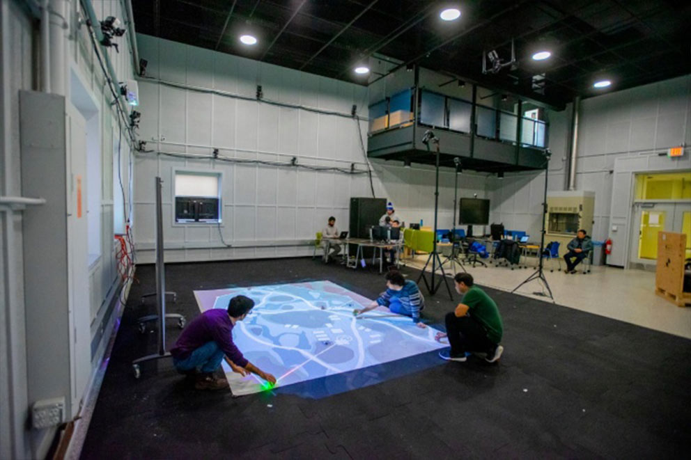 Creating a simulated environment to demonstrate how autonomous air and ground robots can work together