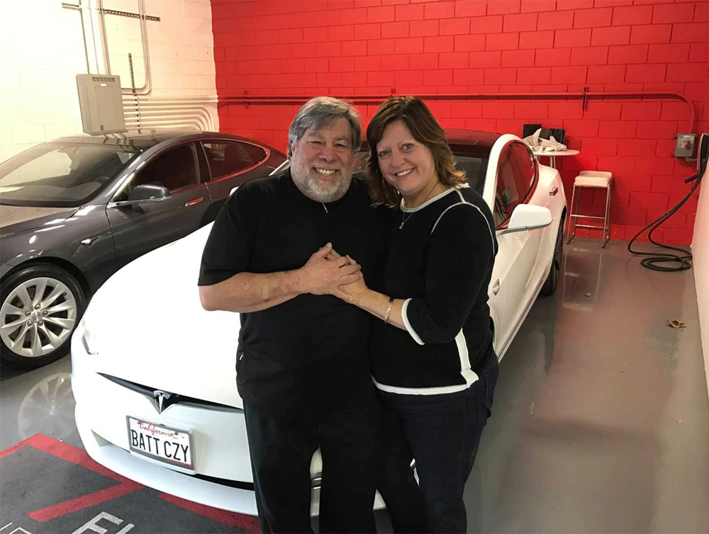 Steve Wozniak and his wife Janet, with a 2016 Tesla Model S